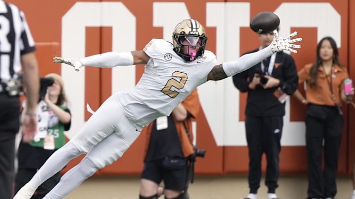 Nov 1, 2025; Austin, Texas, USA; Vanderbilt Commodores defensive back Randon Fontenette (2) attempts to intercept  a pass during the first half against the Texas Longhorns at Darrell K Royal-Texas Memorial Stadium. Mandatory Credit: Scott Wachter-Imagn Images