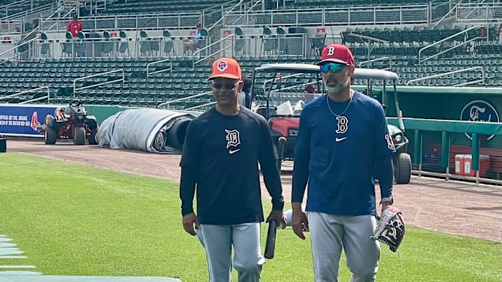 Detroit Tigers third base coach Joey Cora (left) and Boston Red Sox manager Alex Cora (right) at JetBlue Park at Fenway South on Feb. 29, 2024, in Fort Myers, Florida.