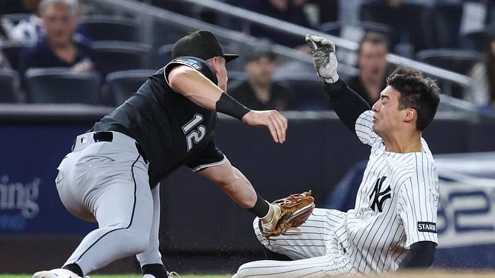 Jun 18, 2026; Bronx, New York, USA;  New York Yankees shortstop Anthony Volpe (11) is tagged out by Chicago White Sox third baseman Colson Montgomery (12) trying to extend a double into a triple in the eighth inning at Yankee Stadium. Mandatory Credit: Wendell Cruz-Imagn Images