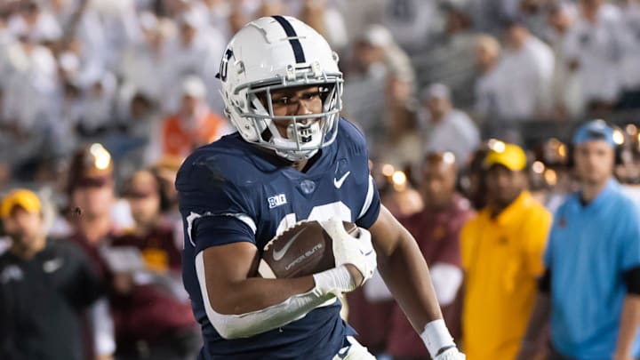 Penn State's Nick Singleton (10) takes off on a 16-yard touchdown run in the third quarter against Minnesota at Beaver Stadium on Saturday, Oct. 22, 2022, in State College.

Hes Dr 102222 Whiteout