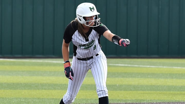 Iowa Park's Jacie Barnes looks to steal third during a game against Henrietta on Thursday, April 17, 2025 at Iowa Park.