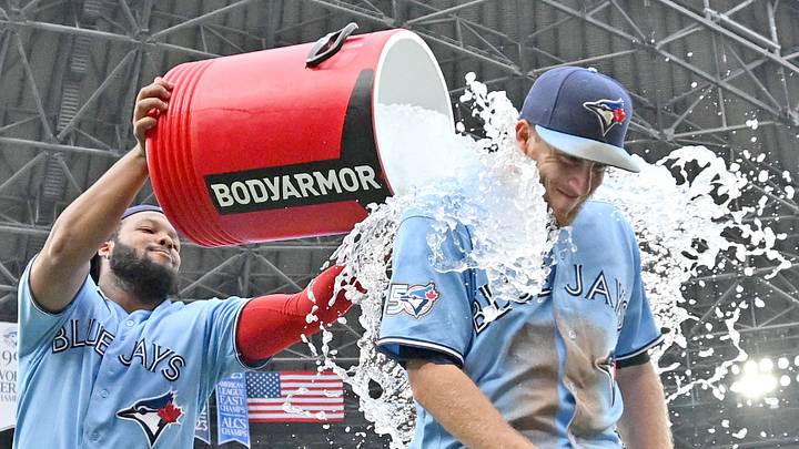 Myles Straw gets doused with ice water by first baseman Vladimir Guerrero Jr. to celebrate Wednesday's victory over Detroit (Credit: Dan Hamilton-Imagn Images Myles Straw gets doused with ice water by first baseman Vladimir Guerrero Jr. to celebrate Wednesday's victory over Detroit (Credit: Dan Hamilton-Imagn Images