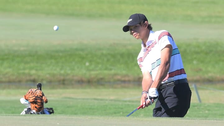 Benjamin golfer Charlie Woods chips the ball into the green during play at the Junior Orange Bowl on Jan. 3, 2026. Benjamin golfer Charlie Woods chips the ball into the green during play at the Junior Orange Bowl on Jan. 3, 2026.