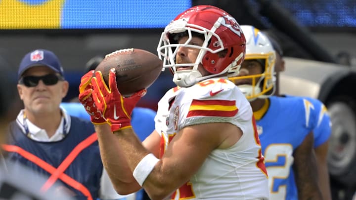 Sep 29, 2024; Inglewood, California, USA;  Kansas City Chiefs tight end Travis Kelce (87) catches a pass in the first half against the Los Angeles Chargers at SoFi Stadium. Mandatory Credit: Jayne Kamin-Oncea-Imagn Images