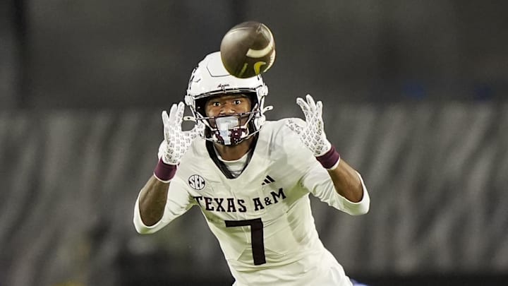 Nov 8, 2025; Columbia, Missouri, USA; Texas A&M Aggies wide receiver KC Concepcion (7) returns a punt during the second half against the Missouri Tigers at Faurot Field at Memorial Stadium. Mandatory Credit: Jay Biggerstaff-Imagn Images