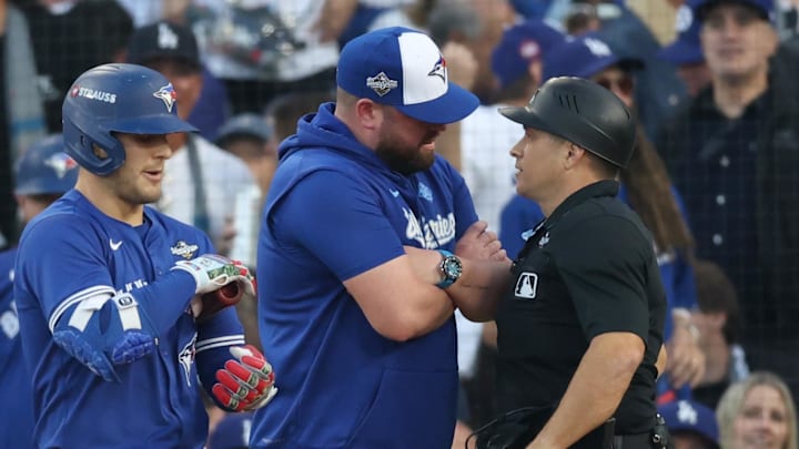 Blue Jays manager John Scneider wasn't happy after a delayed strike call from home plate umpire Mark Wegner