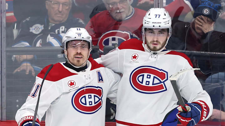 Feb 4, 2026; Winnipeg, Manitoba, CAN; Montreal Canadiens right wing Brendan Gallagher (11) celebrates a goal against the Winnipeg Jets with center Kirby Dach (77) in the third period at Canada Life Centre. Mandatory Credit: James Carey Lauder-Imagn Images