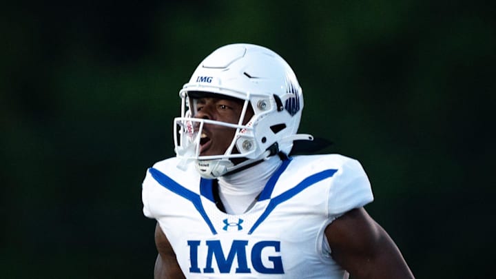 IMG's Gavin Nix (6) celebrates a stop against Lipscomb at Lipscomb's Reese Smith Football Field in Nashville, Tenn., Friday night, Aug. 18, 2023. IMG went on to win the game 35-10.