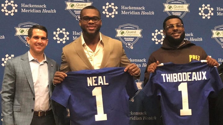 Giants general manager Joe Schoen, left, poses with first-round picks Evan Neal, center, and Kayvon Thibodeaux, right, at their introductory news conference Saturday in East Rutherford, NJ.

Schoen Neal Thibs A