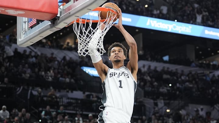 San Antonio Spurs center Victor Wembanyama dunks the ball.