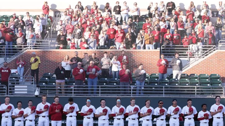 The University of Alabama Baseball Team during the National Anthem against Tennessee at Sewell-Thomas Stadium in Tuscaloosa, AL on Friday, Mar 21, 2025.