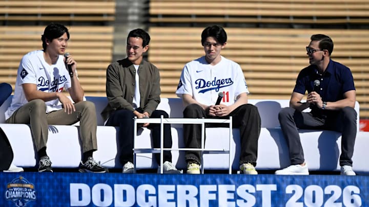 Los Angeles, CA - January 31: Shohei Ohtani, left, speaks as interpreter Will Ireton, pitcher Roki Sasaki of the Los Angeles Dodgers along with announcer Joe Davis look on during a stage show during the annual DodgerFest at Dodger Stadium in Los Angeles on Saturday, January 31, 2026. 