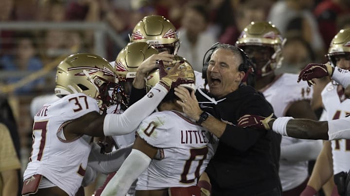 Oct 18, 2025; Stanford, California, USA;  Florida State Seminoles head coach Mike Norvell celebrates with defensive back Earl Little Jr. (0) during the first quarter against the Stanford Cardinal at Stanford Stadium. Mandatory Credit: Stan Szeto-Imagn Images