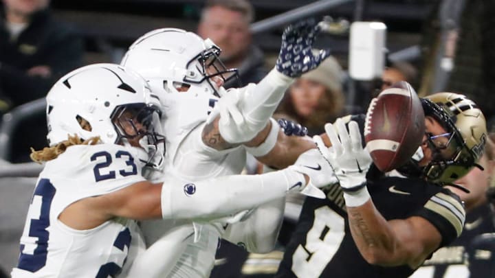 Penn State Nittany Lions cornerback Antoine Belgrave-Shorter (23) and Penn State Nittany Lions cornerback Cam Miller (5) defend the pass intended for Purdue Boilermakers wide receiver CJ Smith (9) Saturday, Nov. 16, 2024, during the NCAA football game at Ross-Ade Stadium in West Lafayette, Ind. Penn State Nittany Lions won 49-10.