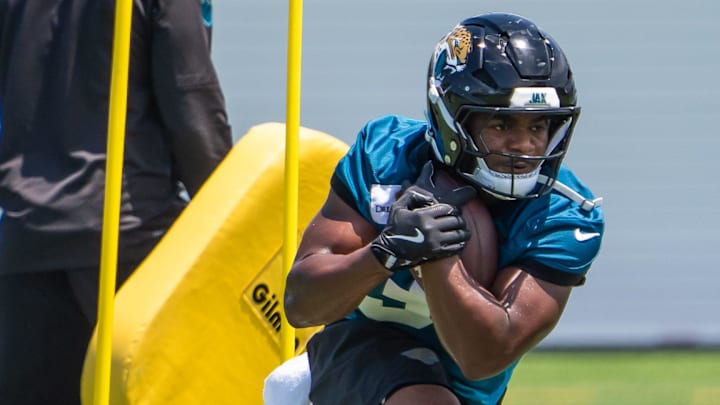 Jacksonville Jaguars running back Keilan Robinson (31) runs the poles during the fourth organized team activity at the Miller Electric Center in Jacksonville, Fla. Tuesday, May 27, 2025. [Doug Engle/Florida Times-Union]