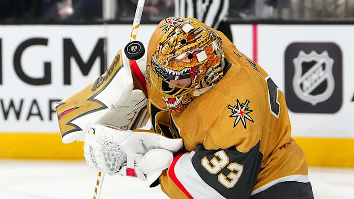 Jan 15, 2026; Las Vegas, Nevada, USA; Vegas Golden Knights goaltender Adin Hill (33) makes a save against the Toronto Maple Leafs during the third period at T-Mobile Arena. Mandatory Credit: Stephen R. Sylvanie-Imagn Images