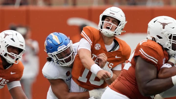 Sep 6, 2025; Austin, Texas, USA; Texas Longhorns quarterback Arch Manning (16) reacts after getting hit by San Jose State Spartans linebacker Taniela Latu (4) during the second half at Darrell K Royal-Texas Memorial Stadium. Mandatory Credit: Scott Wachter-Imagn Images Sep 6, 2025; Austin, Texas, USA; Texas Longhorns quarterback Arch Manning (16) reacts after getting hit by San Jose State Spartans linebacker Taniela Latu (4) during the second half at Darrell K Royal-Texas Memorial Stadium. Mandatory Credit: Scott Wachter-Imagn Images