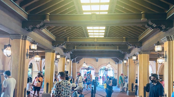 Visitors wait in socially-distanced lines for Pirates of the Caribbean.

Pirates2