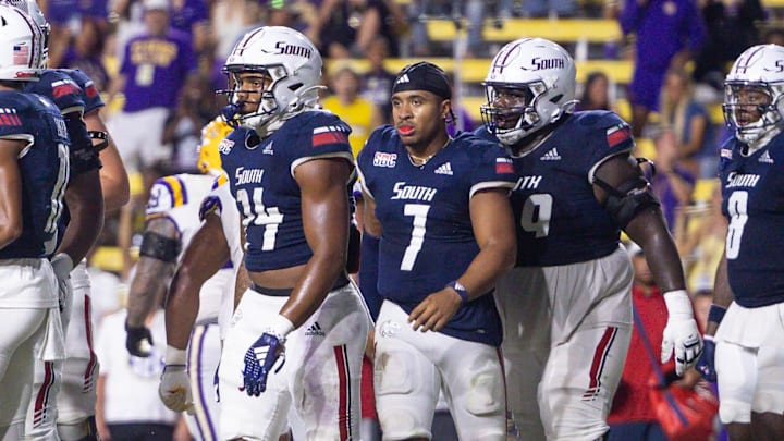 Sep 28, 2024; Baton Rouge, Louisiana, USA; South Alabama Jaguars quarterback Gio Lopez (7) loses his helmet on a play against the LSU Tigers during the second half at Tiger Stadium. Mandatory Credit: Stephen Lew-Imagn Images Sep 28, 2024; Baton Rouge, Louisiana, USA; South Alabama Jaguars quarterback Gio Lopez (7) loses his helmet on a play against the LSU Tigers during the second half at Tiger Stadium. Mandatory Credit: Stephen Lew-Imagn Images