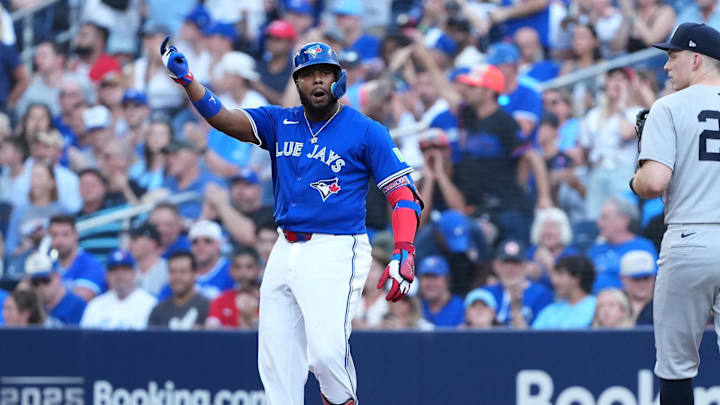 Oct 4, 2025; Toronto, Ontario, CAN; Toronto Blue Jays first baseman Vladimir Guerrero Jr. (27) celebrates after a single in the third inning against the New York Yankees during game one of the ALDS round for the 2025 MLB playoffs at Rogers Centre. 