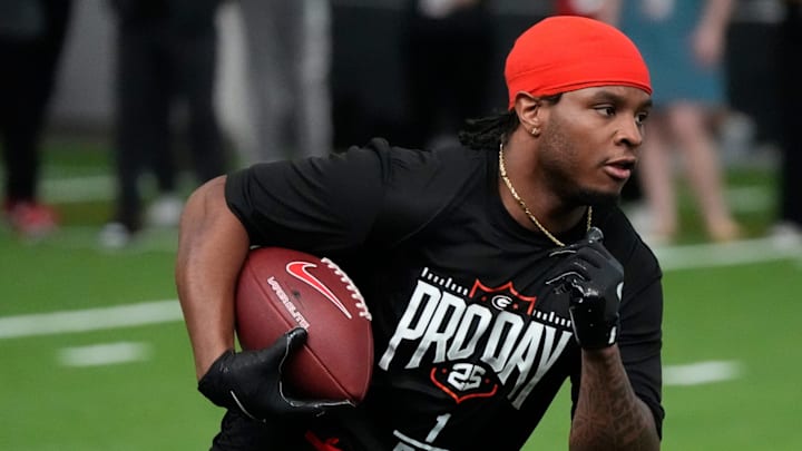 Former Georgia running back Trevor Etienne (1) runs a drill during UGA Footballs Pro Day in Athens, Ga., on Wednesday, March 12, 2025. Representatives from all 32 NFL teams are on hand to watch former UGA football players in action. Former Georgia running back Trevor Etienne (1) runs a drill during UGA Footballs Pro Day in Athens, Ga., on Wednesday, March 12, 2025. Representatives from all 32 NFL teams are on hand to watch former UGA football players in action.