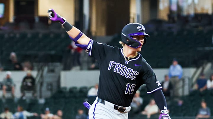 TCU outfielder Sawyer Strosnider throws up the Frog symbol after hitting his first homerun of the year vs. the Vanderbilt Commodores. 