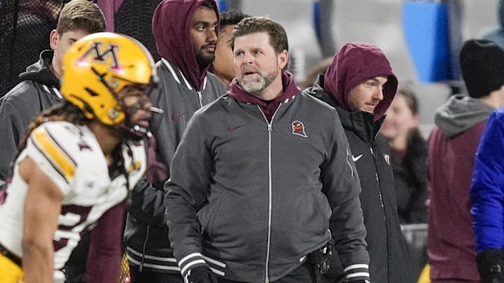 Jan 3, 2025; Charlotte, NC, USA; Virginia Tech Hokies head coach Brent Fry on the sideline during the second quarter against the Minnesota Golden Gophers at the Duke’s Mayo Bowl at Bank of America Stadium. 