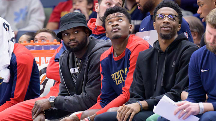 Jan 15, 2025; New Orleans, Louisiana, USA; New Orleans Pelicans forward Zion Williamson, left, center Yves Missi, and forward Herbert Jones (2) watch from the bench during the second half against the Dallas Mavericks at Smoothie King Center. Mandatory Credit: Matthew Hinton-Imagn Images Jan 15, 2025; New Orleans, Louisiana, USA; New Orleans Pelicans forward Zion Williamson, left, center Yves Missi, and forward Herbert Jones (2) watch from the bench during the second half against the Dallas Mavericks at Smoothie King Center. Mandatory Credit: Matthew Hinton-Imagn Images