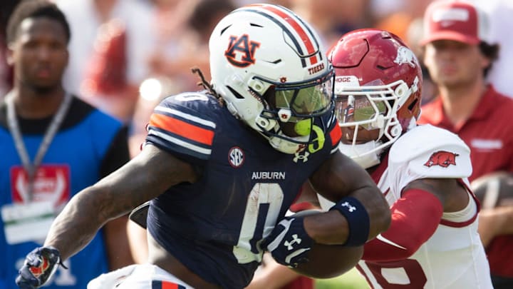 Auburn Tigers running back Damari Alston lost the ball in the end zone after a long run against the Arkansas Razorbacks. Auburn Tigers running back Damari Alston lost the ball in the end zone after a long run against the Arkansas Razorbacks.