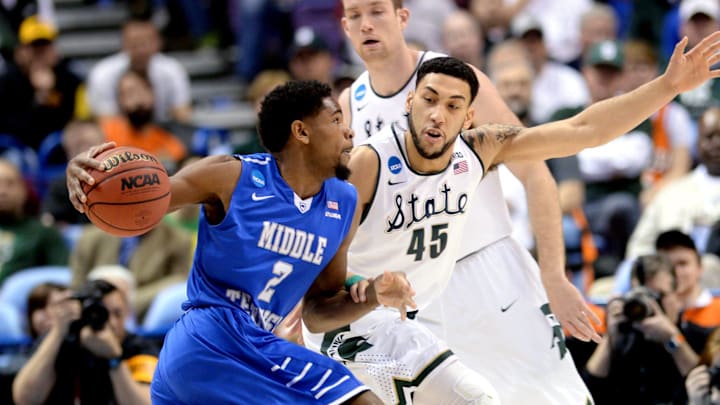 Michigan State senior guard Denzel Valentine (45) guards Middle Tennessee senior guard Perrin Buford (2) during a first round NCAA Tournament game between second-seeded Michigan State and 15-seeded Middle Tennessee Friday, March 18, 2016 at the Scottrade Center in St. Louis.

Msu V Mtsu Game