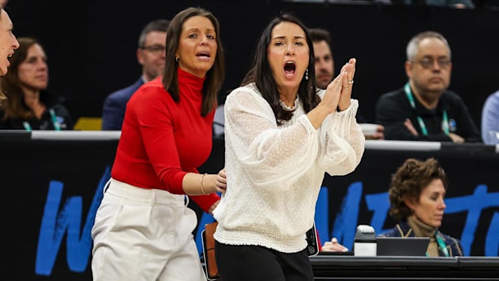 Mar 10, 2024; Minneapolis, MN, USA; Nebraska Cornhuskers head coach Amy Williams reacts during the first half against the Iowa Hawkeyes at Target Center.