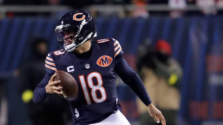 Chicago Bears quarterback Caleb Williams (18) eludes Green Bay Packers defensive end Rashan Gary (52) during their football game Saturday, December 20, 2025, at Soldier Field in Chicago, Illinois.