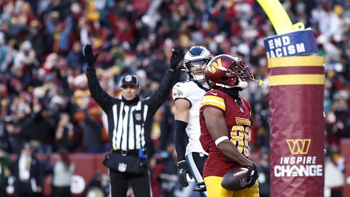 Dec 22, 2024; Landover, Maryland, USA; Washington Commanders wide receiver Jamison Crowder (80) celebrates after catching the game winning touchdown pass against the Philadelphia Eagles in the final seconds during the fourth quarter at Northwest Stadium. Mandatory Credit: Geoff Burke-Imagn Images Dec 22, 2024; Landover, Maryland, USA; Washington Commanders wide receiver Jamison Crowder (80) celebrates after catching the game winning touchdown pass against the Philadelphia Eagles in the final seconds during the fourth quarter at Northwest Stadium. Mandatory Credit: Geoff Burke-Imagn Images