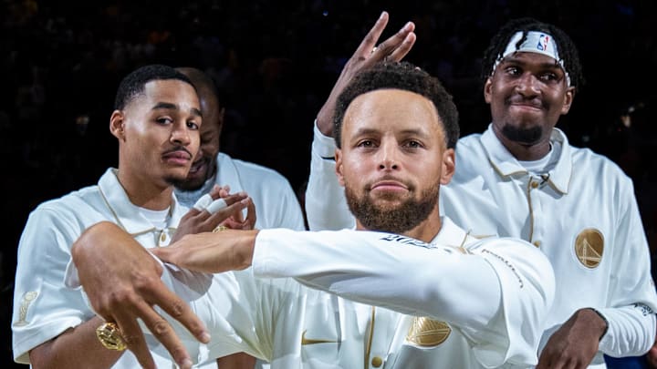 October 18, 2022; San Francisco, California, USA; Golden State Warriors guard Jordan Poole (left, 3), guard Stephen Curry (center, 30), and center Kevon Looney (right, 5) celebrate with their championship rings before the game against the Los Angeles Lakers at Chase Center. Mandatory Credit: Kyle Terada-Imagn Images October 18, 2022; San Francisco, California, USA; Golden State Warriors guard Jordan Poole (left, 3), guard Stephen Curry (center, 30), and center Kevon Looney (right, 5) celebrate with their championship rings before the game against the Los Angeles Lakers at Chase Center. Mandatory Credit: Kyle Terada-Imagn Images