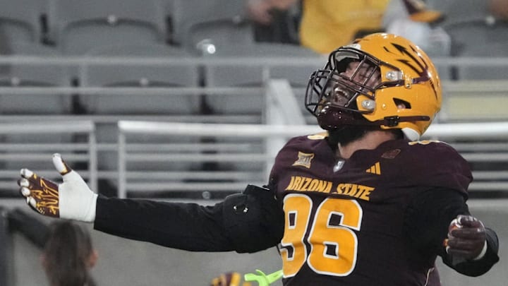 Arizona State Sun Devils defensive lineman Anthonie Cooper (96) celebrates his interception against the Northern Arizona Lumberjacks during a football game at Mountain America Stadium in Tempe on Aug. 30, 2025.