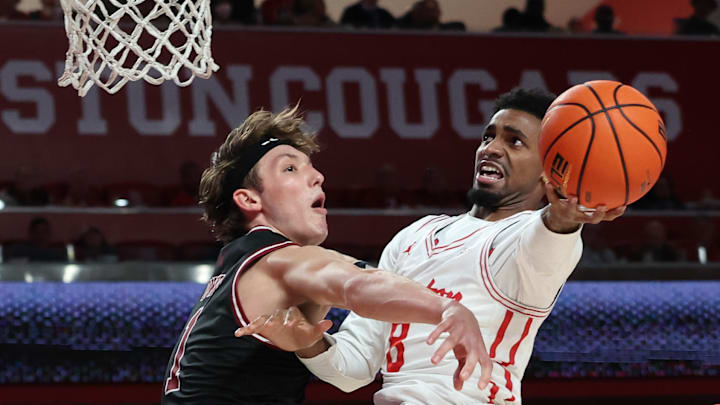 Houston guard Mylik Wilson (right)