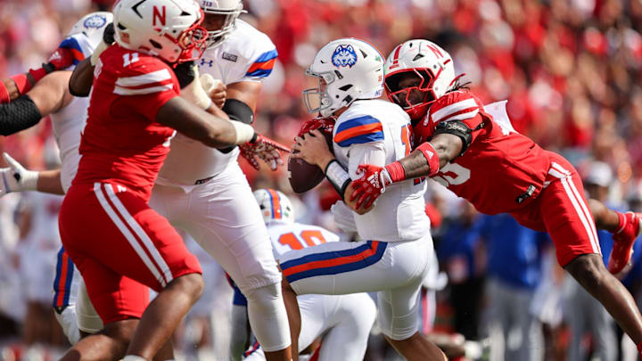 Nebraska linebacker Marques Watson-Trent sacks Houston Christian quarterback Jake Weir for a 6-yard loss in the first quarter