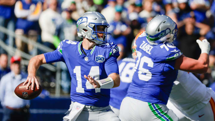 Oct 5, 2025; Seattle, Washington, USA; Seattle Seahawks quarterback Sam Darnold (14) stands in the pocket against the Tampa Bay Buccaneers during the first half at Lumen Field.