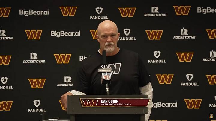 Washington Commanders head coach Dan Quinn speaks with reporters following the team’s game against the Dallas Cowboys. Washington Commanders head coach Dan Quinn speaks with reporters following the team’s game against the Dallas Cowboys.