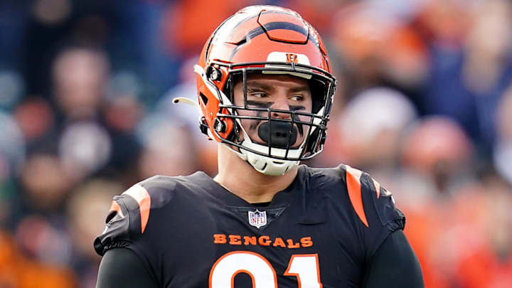 Cincinnati Bengals defensive end Trey Hendrickson (91), left, and Cincinnati Bengals defensive end Sam Hubbard (94) celebrate a sack in the second quarter during a Week 16 NFL game against the Baltimore Ravens, Sunday, Dec. 26, 2021, at Paul Brown Stadium in Cincinnati.

Baltimore Ravens At Cincinnati Bengals Dec 26