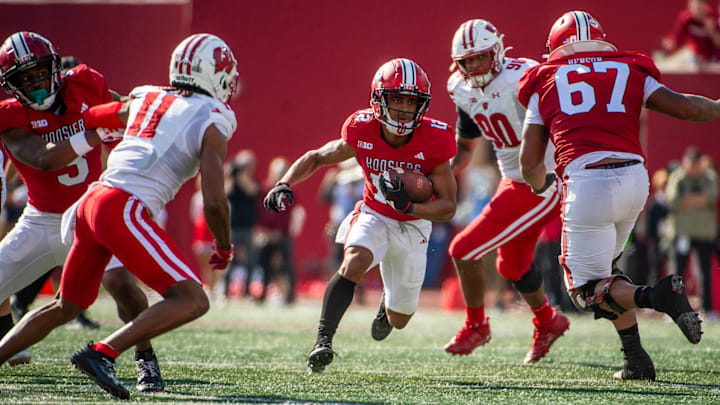 Nov 4, 2023; Bloomington, Indiana, USA; Indiana's Jaylin Lucas (12) runs the ball during the first