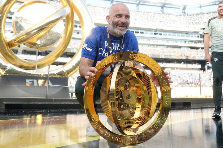 Enzo Maresca posing with the Club World Cup trophy. Enzo Maresca posing with the Club World Cup trophy.