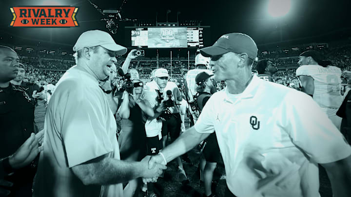Sep 21, 2024; Norman, Oklahoma, USA; Tennessee Volunteers head coach Josh Heupel (left) shakes hands with Oklahoma Sooners head coach Brent Venables (right) after the game at Gaylord Family-Oklahoma Memorial Stadium. 