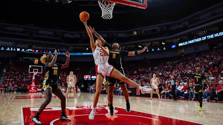 Nebraska basketball forward Natalie Potts (22) fights to score against Southeastern Louisiana.