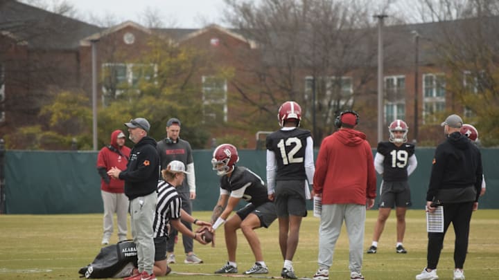 Alabama quarterback Austin Mack takes a snap at practice under the watchful eyes of Nick Sheridan and Ryan Grubb Alabama quarterback Austin Mack takes a snap at practice under the watchful eyes of Nick Sheridan and Ryan Grubb