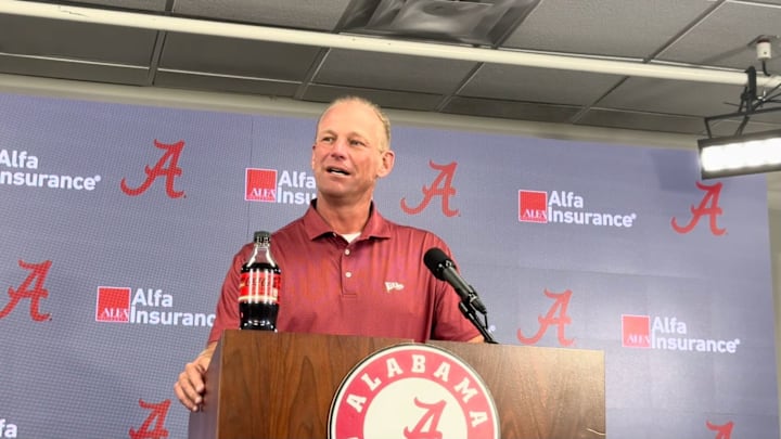 Kalen DeBoer at the podium during his Monday press conference ahead of the FSU matchup