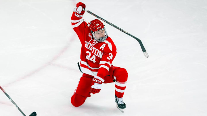 Boston University forward Cole Eiserman celebrates a goal. 