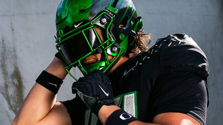Senior edge rusher Teitum Tuioti models the Oregon Ducks' uniforms for the Oct. 17 game at Autzen Stadium against the Nebraska Cornhuskers. Senior edge rusher Teitum Tuioti models the Oregon Ducks' uniforms for the Oct. 17 game at Autzen Stadium against the Nebraska Cornhuskers.