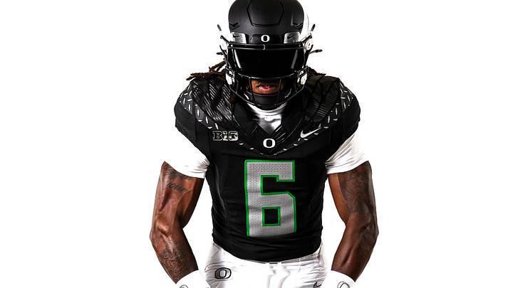 Dierre Hill Jr. models the Oregon Ducks' uniforms for their Halloween night game against the Northwestern Wildcats.