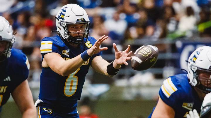 Northern Arizona quarterback Ty Pennington (6) Northern Arizona quarterback Ty Pennington (6)